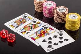Live blackjack dealer dealing cards at 8k8 casino table